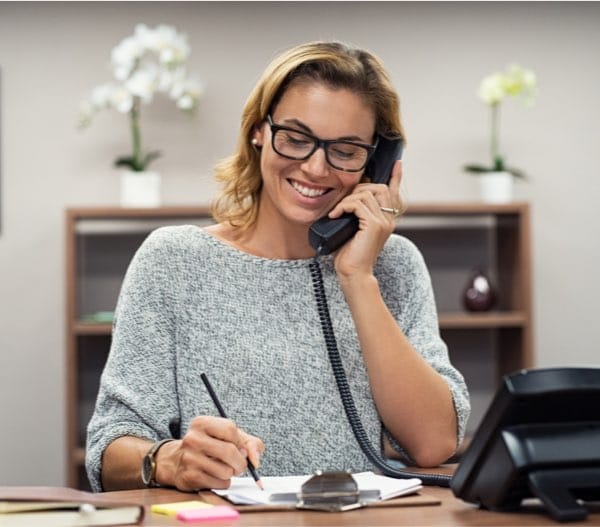 woman talking on phone at creative office